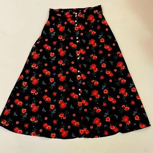 Shein floral print below the knees button up skirt. 100% polyester grandma chic.